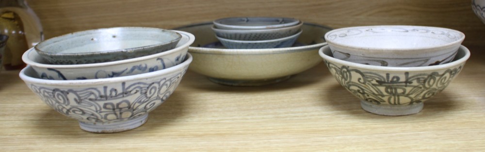 A group of Chinese and Sawankhalok blue and white ceramic bowls and dishes (10)
